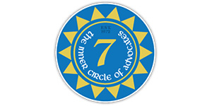 A logo for Kramer Dillof Livingston & Moore featuring blue, yellow, and the number 7.